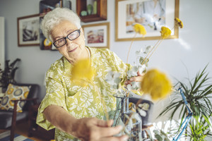 Lady arranging flowers