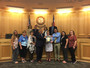 Accounting staff with the Board of Commissioners accepting an award.