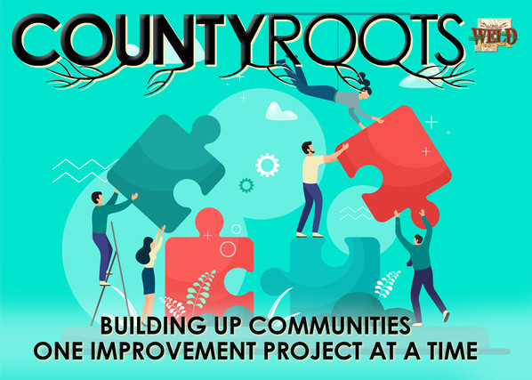 People working together to put pieces of a puzzle together