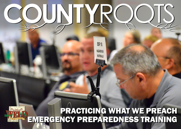 People working in Weld County's Emergency Operations Center