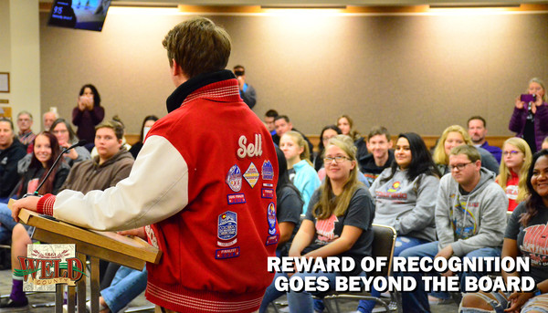 Colton Sell addressing the audience in the Centennial Hearing Room. 