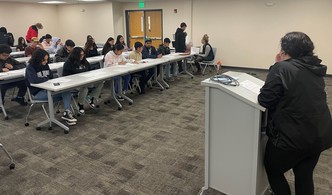Youth sitting in the Weld Works 4 Youth Orientation.