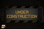A construction sign with the words "under construction" written on it.