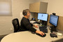 Veterans Service Officer Stephanie Davis sitting at her desk.