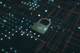 A pad lock with computer information in the background. 