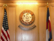 County seal in the hearing room.