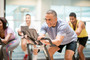 Man riding a stationary bike.