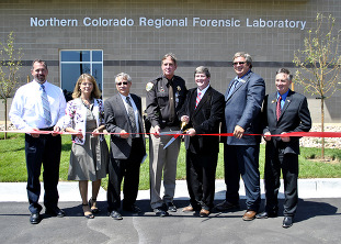 Weld County Commissioners and other officials cutting the ribbon to open the NCRFL in 2013,