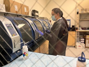 A woman working in a lab.