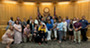 Members of the Department of Human Services' kinship care team standing with the Weld County Board of Commissioners.