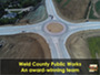 An aerial view of the 35th Ave. and O St. roundabout. Text reads: "Weld County Public Works. An award-winning team."