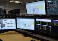 Computer monitors in Weld County's 911 dispatching center.