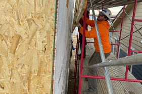 A WCYCC member working on a house.