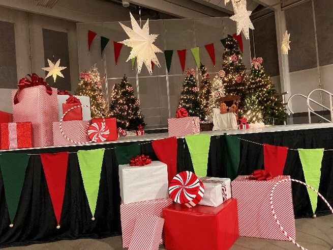 A festive table covered in wrapped gifts