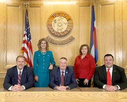 The Weld County Board of Commissioners sitting in the hearing room. 