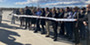 Commissioner James, Ross and other officials at the ribbon cutting for north I-25 improvements