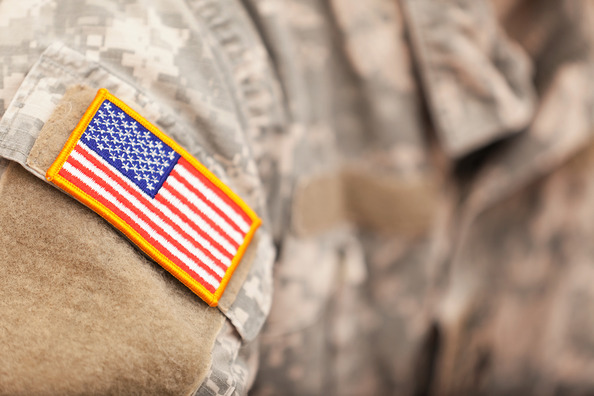 An American Flag on a soldier's uniform.