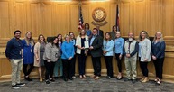Members of the Weld County Department of Human Services with the Weld County Board of Commissioners.