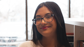 Young girl, Janie, smiling at camera