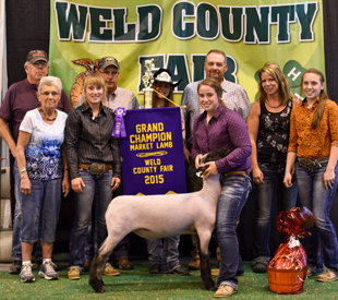 Kayla Frink and her Family posing for a picture at the 2015 Weld County Fair.