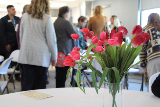 Flowers on a table at the opening of the Hill N' Park senior center.