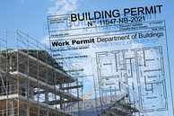 An outline of a building permit against a blue sky. A building under construction sits to the left.