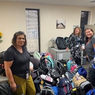 Windsor Community Church members with backpacks.