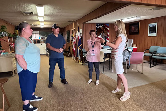 Elizabeth Relford and Cynthia Martin, administrators of Weld County's CDBG program, speaking to people at the Pierce Senior Center. 
