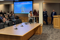 Michelle Raimer, one of many county employees honored by the board, speaking during a board meeting.