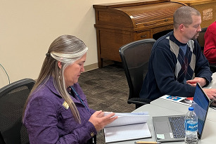 Commissioners Peppler and Maxey in a work session. 