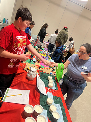 Aaron selling candles