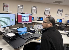 Jaime Villarreal working behind a desk at the resource room