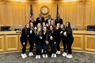 Roosevelt Poms Team poses with Weld County board of commissioners
