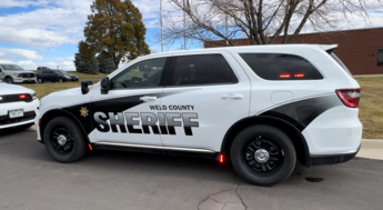An SUV from the Sheriff's Office with its lights flashing. 