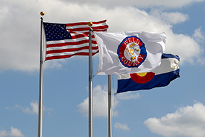 The Weld County, U.S. and Colorado flags.