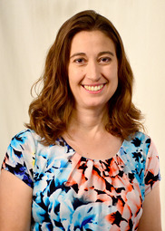 Esther Gesick, Weld County Clerk to the Board, smiling.