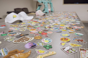 A table of stickers and patches