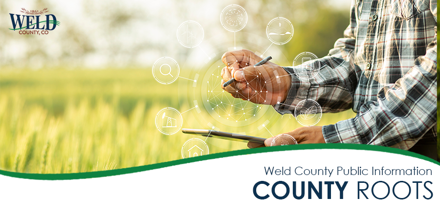 planner in field with tablet