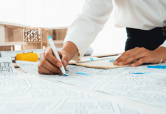 building plans being examined