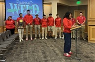 Frontier Academy Wolverines and coaches are recognized at county board meeting