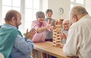 Older adults playing jenga