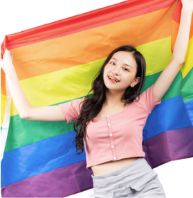 Teenager holding a Pride flag