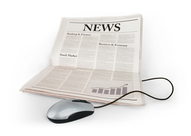 A newspaper with a computer mouse attached to it