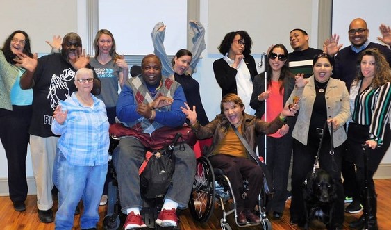 A group of people making silly faces