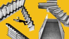 Yellow background, stairs and a waiter