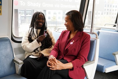 Mayor and student on Metro. 