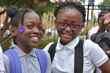Students returning to school. 