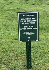 Dogs on leash sign at Lorenzo Allen park