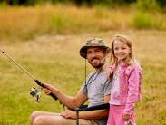 Man and girl fishing