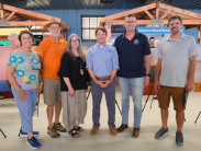 Contest winners with DNREC Secretary Greg Patterson and Gov. Matt Meyer, representing categories from nature to hunting and fishing.
